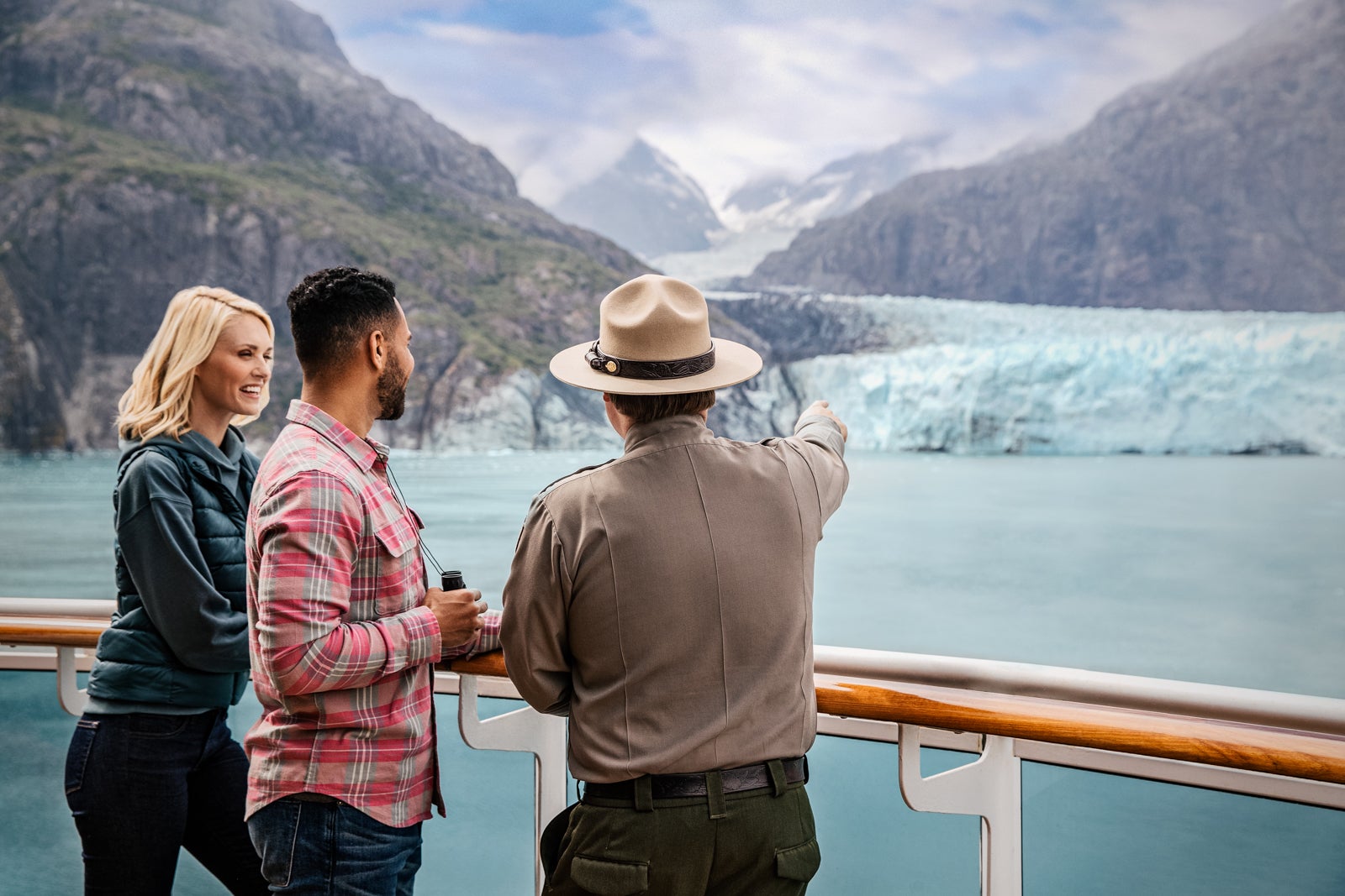 A National Park Service ranger talks with passengers aboard a Princess ship in Glacier Bay National Park.